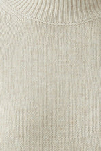 Load image into Gallery viewer, Close-up of a ribbed knit sweater in a light oatmeal beige color, showing the detailed texture of the fabric.