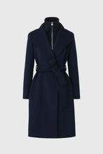 Load image into Gallery viewer, A dark navy blue wrap coat with a high stand collar, front zipper, self-tie belt, and long sleeves, shown on a light gray background.