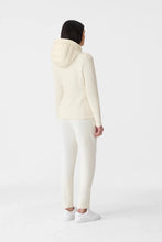 Load image into Gallery viewer, Person wearing a cream-colored hoodie and pants on a white background
