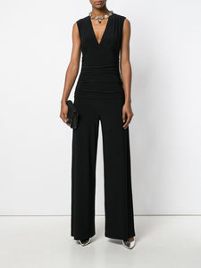 Norma Kamali Sleeveless V-Neck Shirred Waist Jumpsuit in Black